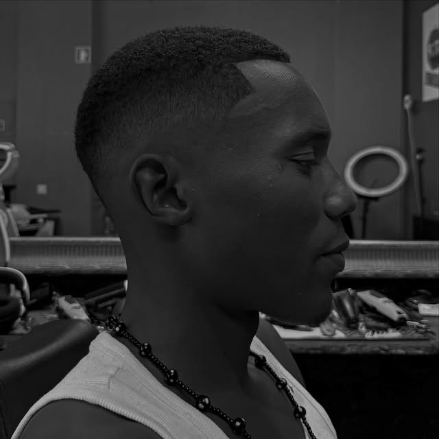 Skin fade with a hard part at Big's Space Albufeira