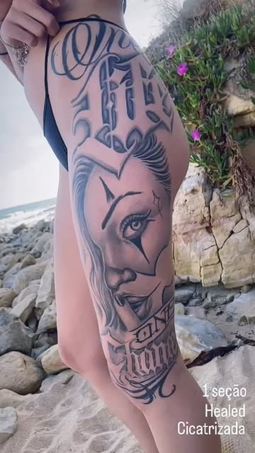 Healed chicano payasa thigh piece with blackletter script