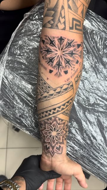 Polynesian geometric forearm sleeve with mandala