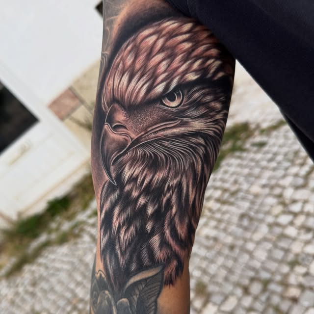 Hyper-detailed black and grey eagle tattoo by MKA Tattoo