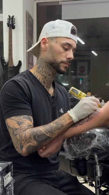 MKA Tattoo working on a client at Big's Space Albufeira
