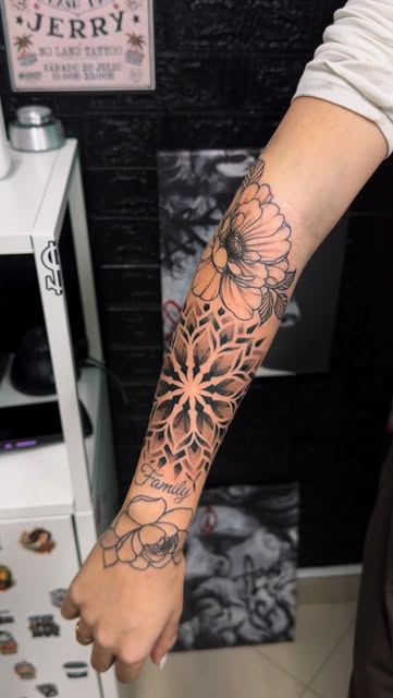Fine line mandala and floral forearm sleeve